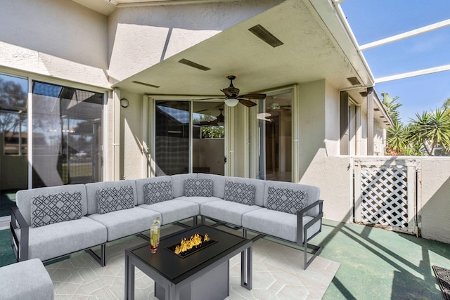 view of patio / terrace with outdoor lounge area and ceiling fan