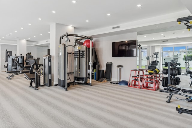 workout area with light wood-type flooring