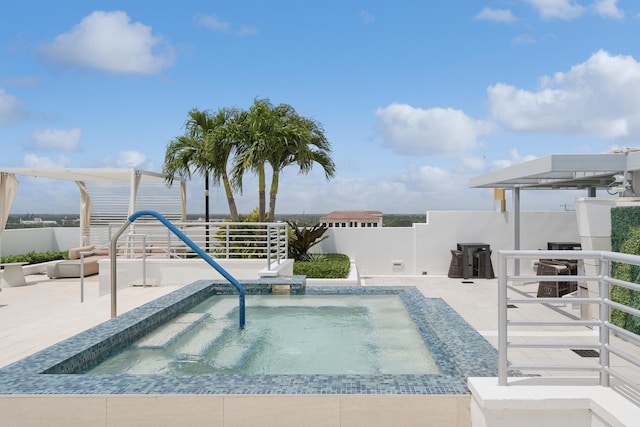 view of pool featuring a patio area