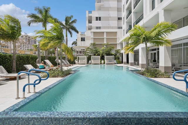 view of swimming pool featuring a patio