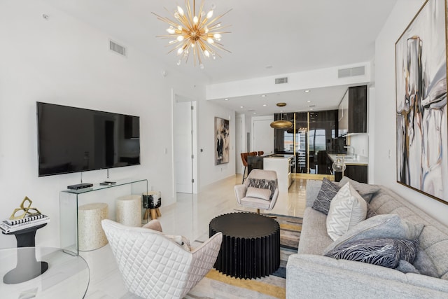 living room with a notable chandelier