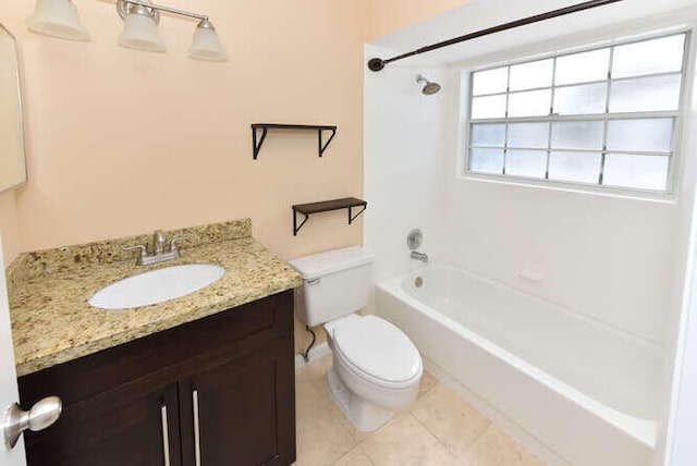 full bathroom featuring tile patterned floors, vanity, toilet, and shower / bath combination