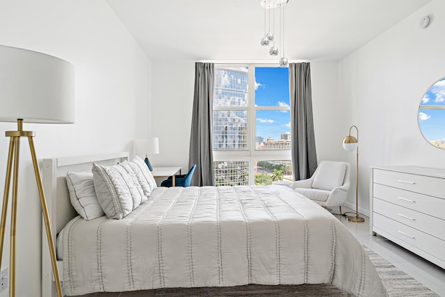 bedroom featuring multiple windows