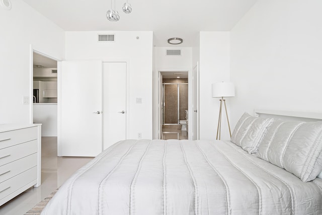 bedroom featuring ensuite bath