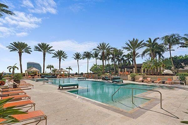 view of swimming pool with a patio area