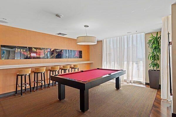 playroom featuring billiards and dark hardwood / wood-style flooring