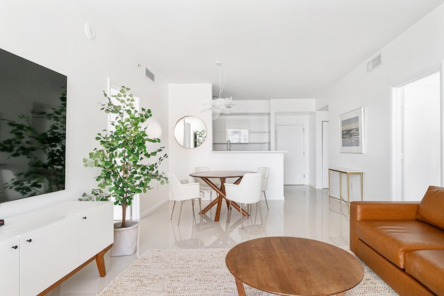 living room featuring ceiling fan