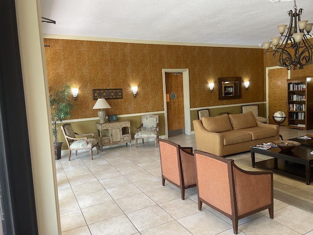 tiled living room featuring crown molding and a notable chandelier