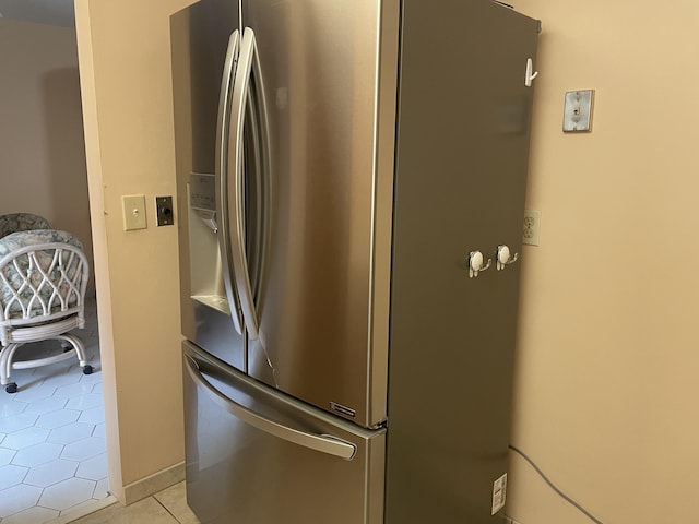 interior details featuring stainless steel fridge