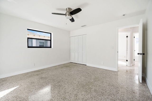 unfurnished bedroom featuring a closet and ceiling fan