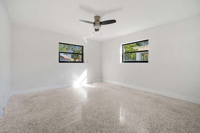 unfurnished room featuring ceiling fan