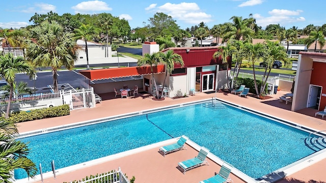 view of pool featuring a patio