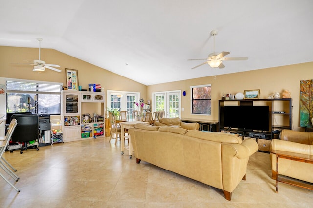 living room featuring lofted ceiling, french doors, ceiling fan, and light tile floors