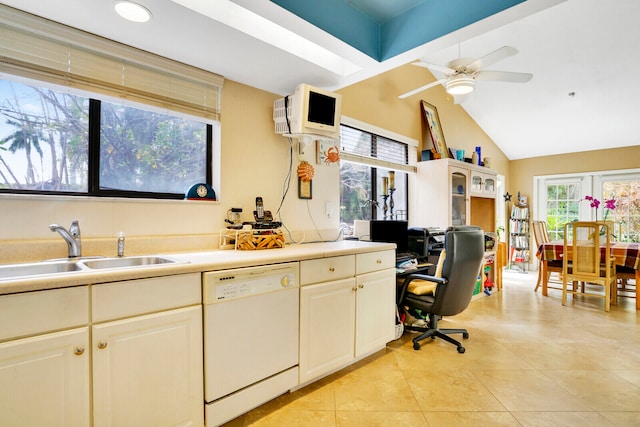 kitchen featuring ceiling fan, light tile floors, sink, lofted ceiling, and white dishwasher