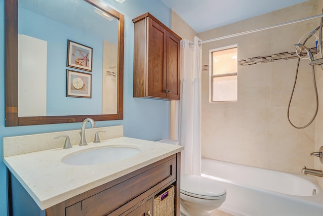 full bathroom with vanity with extensive cabinet space, toilet, and shower / tub combo with curtain