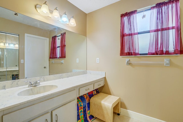 bathroom featuring oversized vanity