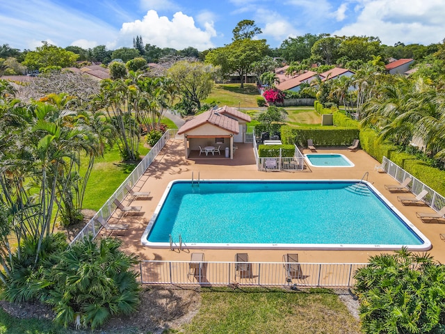 view of swimming pool with a patio area