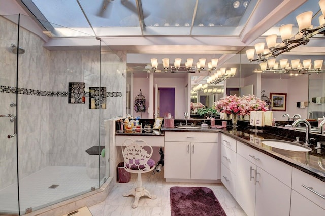 bathroom with vanity and an enclosed shower