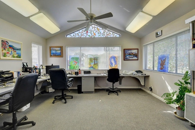 carpeted office with ceiling fan and vaulted ceiling