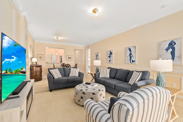 living room with ornamental molding and light colored carpet