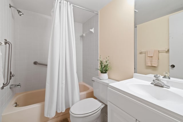 full bathroom featuring toilet, vanity, and shower / bath combo