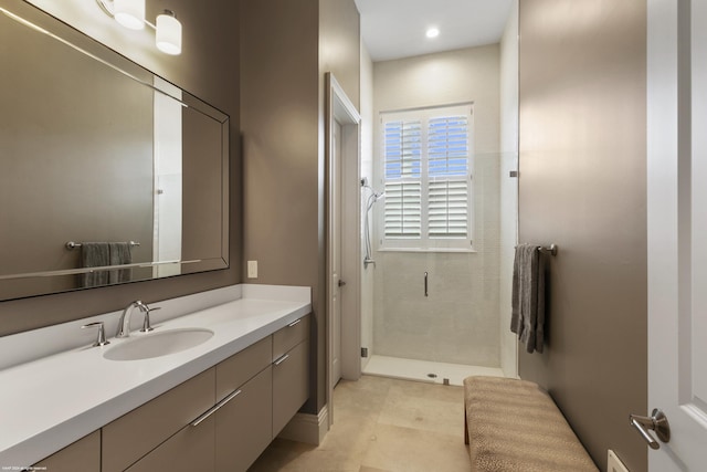 bathroom with vanity and an enclosed shower