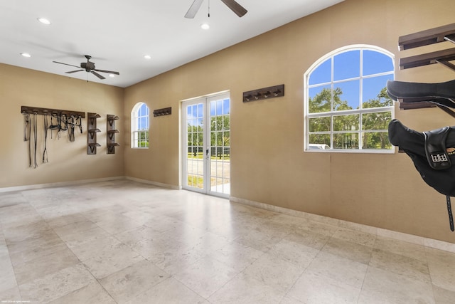 spare room with ceiling fan