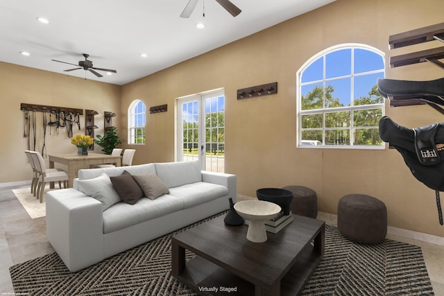 living room featuring ceiling fan