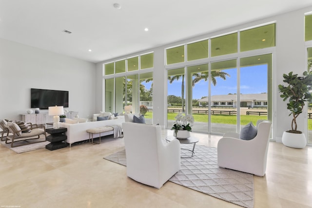 living room featuring expansive windows