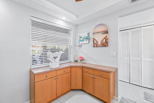 kitchen featuring light tile patterned flooring