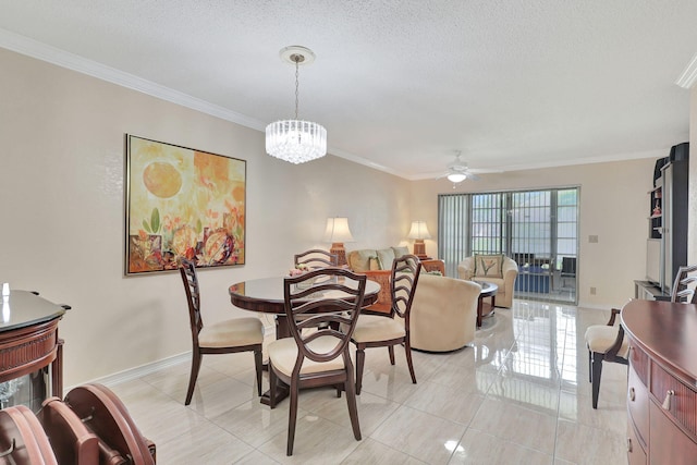 tiled dining room with ceiling fan with notable chandelier, a textured ceiling, and ornamental molding