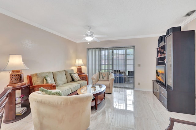 tiled living room with a textured ceiling, ceiling fan, and crown molding