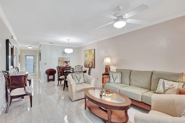 living room featuring crown molding, ceiling fan, a textured ceiling, and light tile flooring