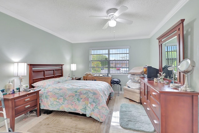 bedroom with a textured ceiling, ceiling fan, and ornamental molding