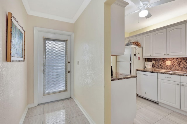 kitchen with white cabinets, white appliances, ornamental molding, tasteful backsplash, and ceiling fan