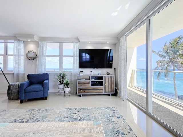 living room featuring ornamental molding, floor to ceiling windows, and light tile floors