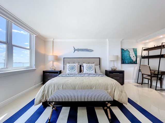 bedroom with crown molding