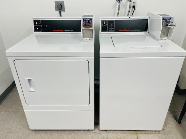 washroom featuring independent washer and dryer, washer hookup, electric dryer hookup, and light tile floors