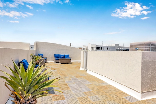 view of patio with central AC and an outdoor living space