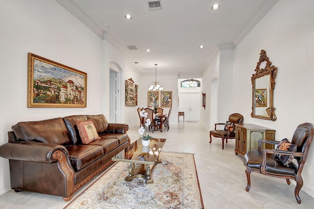 tiled living room with a notable chandelier and ornamental molding