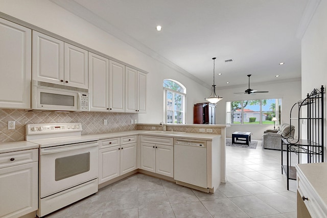 kitchen featuring light tile floors, ceiling fan, tasteful backsplash, and white appliances