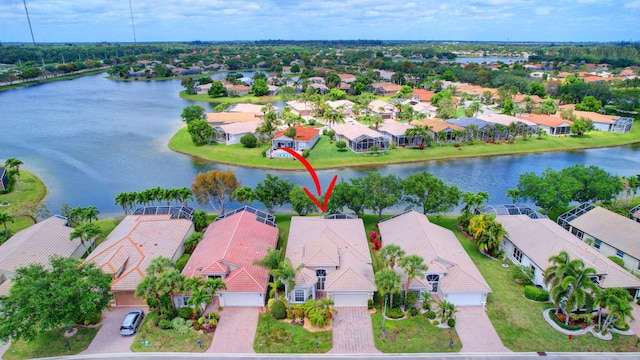 drone / aerial view featuring a water view