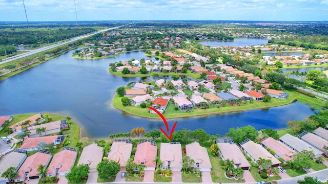 bird's eye view with a water view