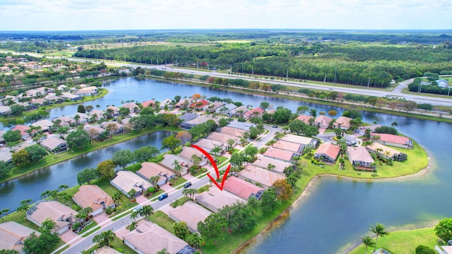 drone / aerial view featuring a water view