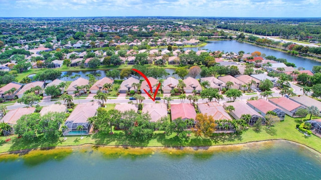 drone / aerial view featuring a water view