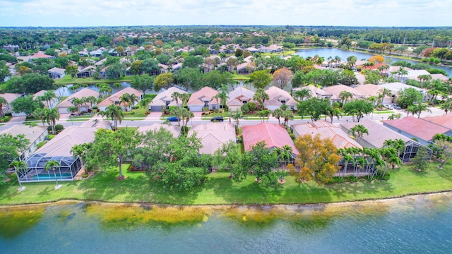 birds eye view of property featuring a water view