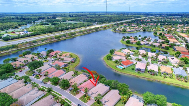 drone / aerial view with a water view