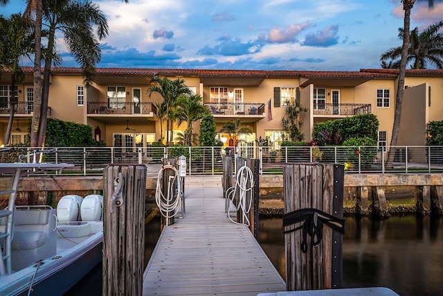 view of dock with a balcony