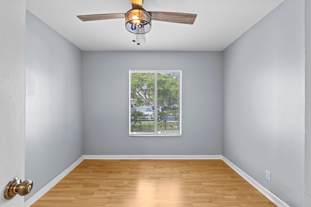 unfurnished room with light hardwood / wood-style flooring and ceiling fan