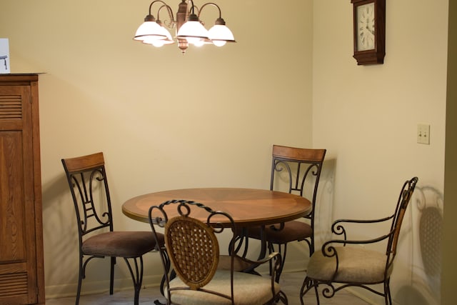 dining room featuring a notable chandelier